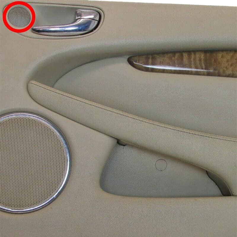 A rear door handle with a tweeter mounted in it